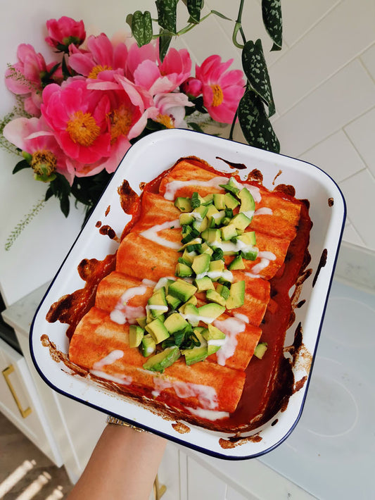 Madeleine's Family Friendly Squash & Black Bean Enchilada's in a ceramic bowl