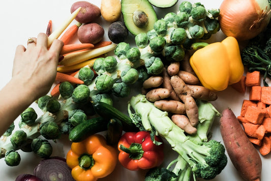 Various nutritious fruits and vegetables on a table