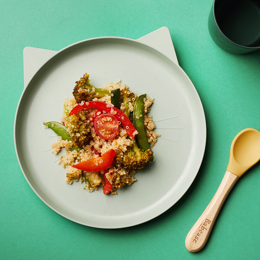 Veggie Quinoa Stir-Fry on a green weaning plate