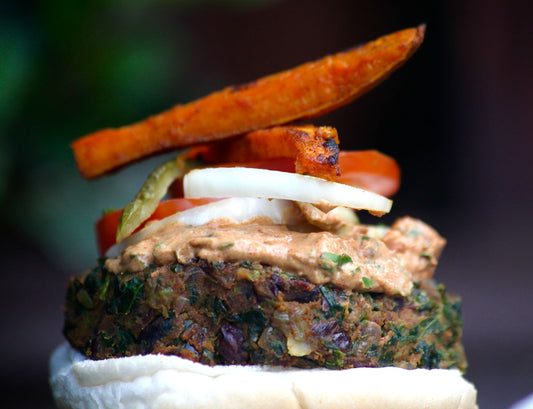 Kale and Bean Burger topped with vegetables